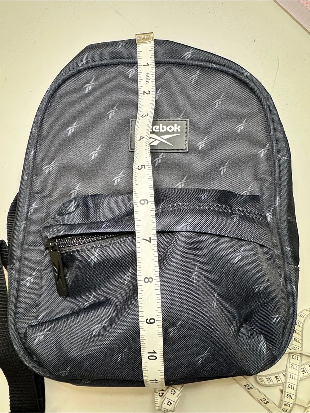 Reebok Black Mini Backpack with Subtle Logo Print. Excellent Condition